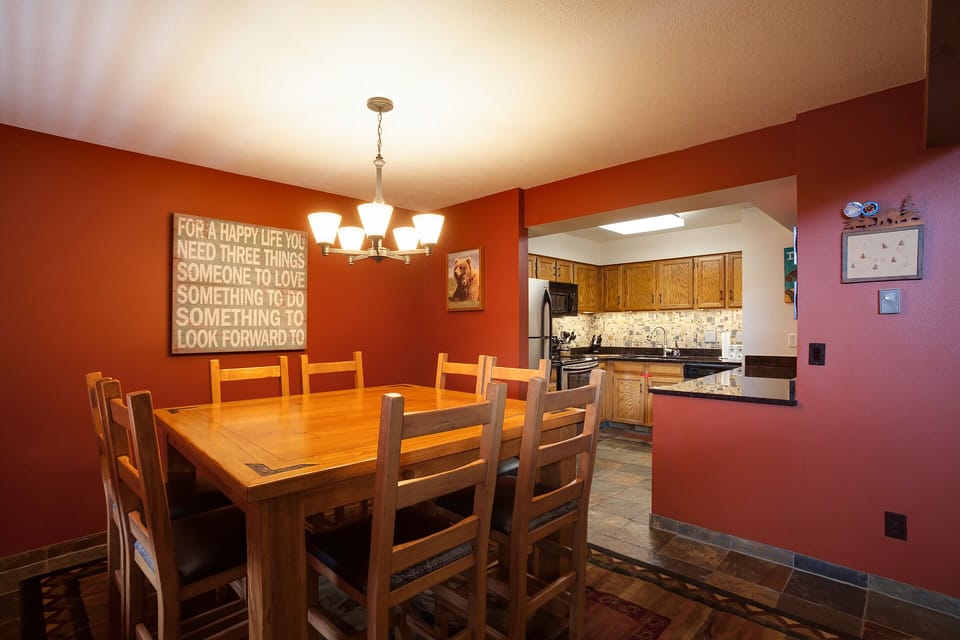 Gather around this spacious dining table for memorable meals with your group. The open kitchen makes cooking and conversation flow seamlessly together.