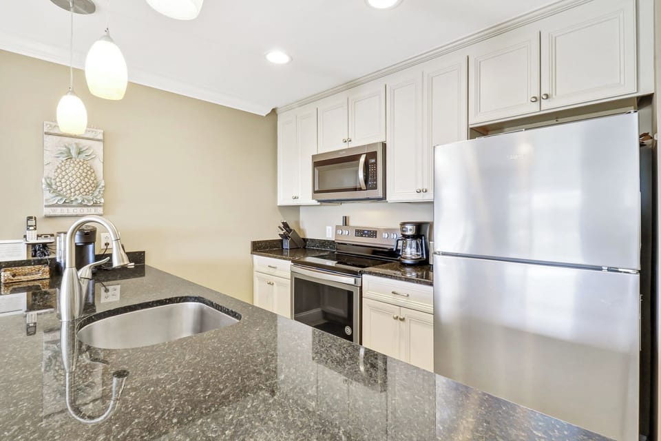 Ocean Dunes 409 - Kitchen View - Fully equipped kitchen for your vacation meals!  Standard drip coffee maker.