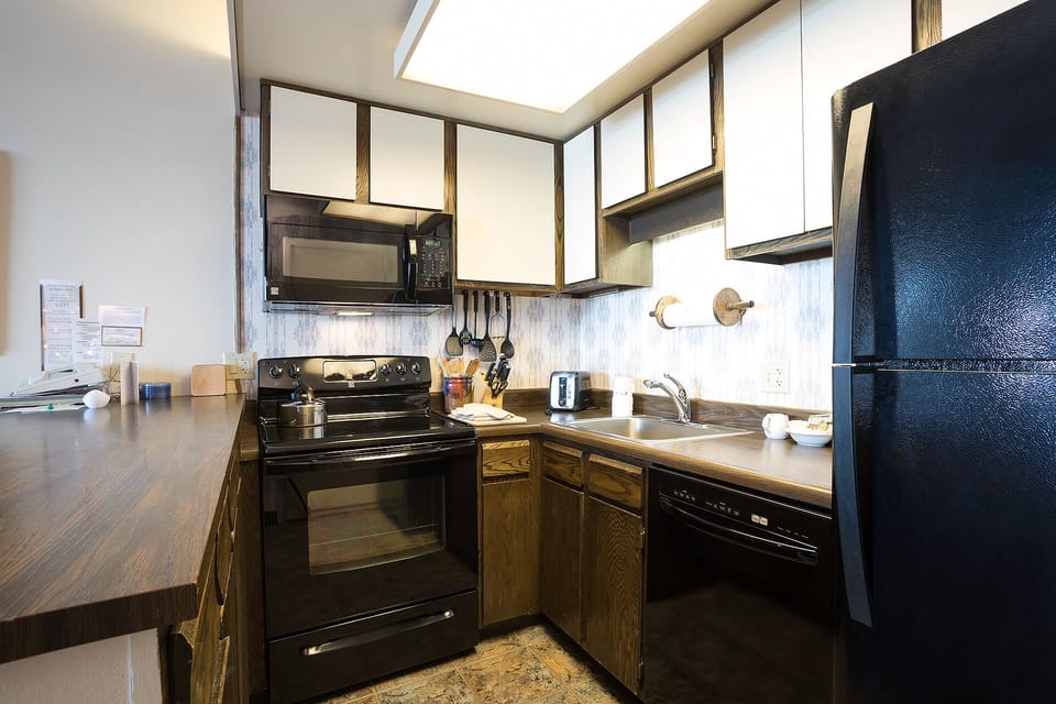Your fully equipped kitchen features modern appliances and plenty of counter space for preparing meals during your stay.
