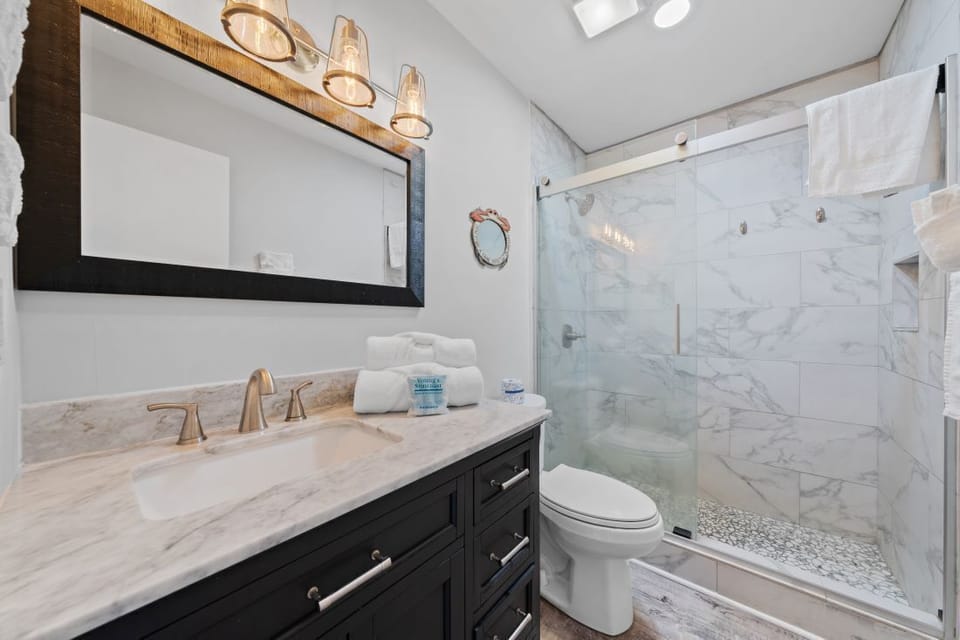 Sand Dollar 28 Remodeled Primary Bathroom with Step-in Shower