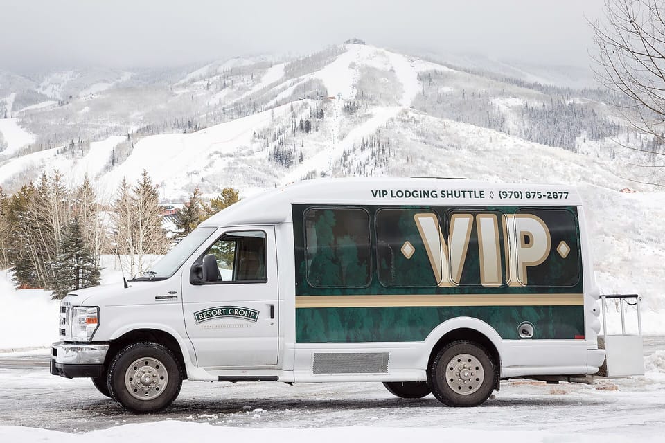 VIP shuttle service provides convenient transportation to nearby ski slopes, with snow-covered mountains creating a perfect winter backdrop for your mountain getaway.