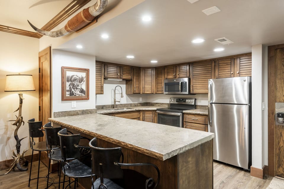 Kitchen with bar seating for 4