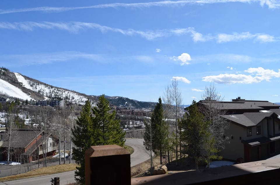 Stunning mountain valley views stretch across snow-capped peaks and winter landscapes from this elevated location.
