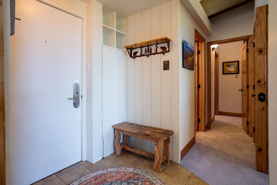 Step inside to your charming mountain retreat, where rustic wood accents and cozy touches create the perfect home base for your alpine adventure.