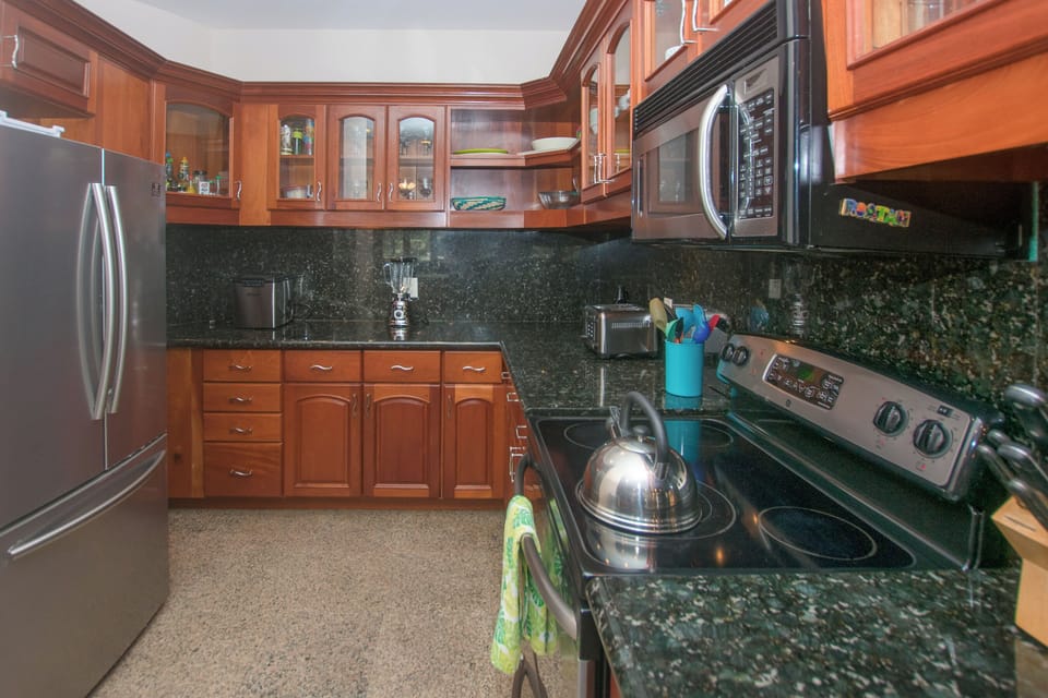 The kitchen has modern appliances