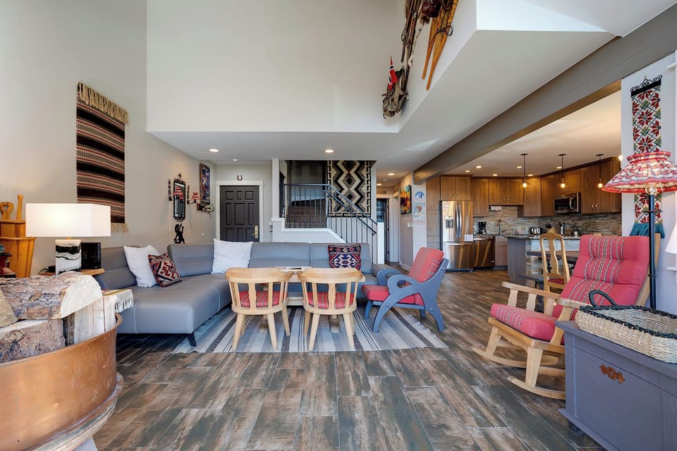 Unwind in your spacious open-concept living area, where Southwest-inspired décor and modern comfort create the perfect retreat for relaxation.
