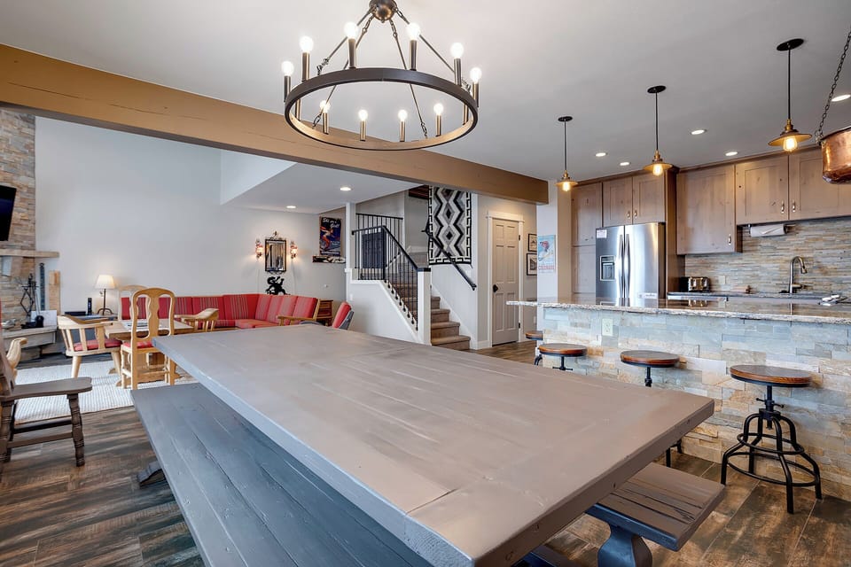 Gather around this stunning marble island where your group can cook, dine, and create memories together in this open-concept space.