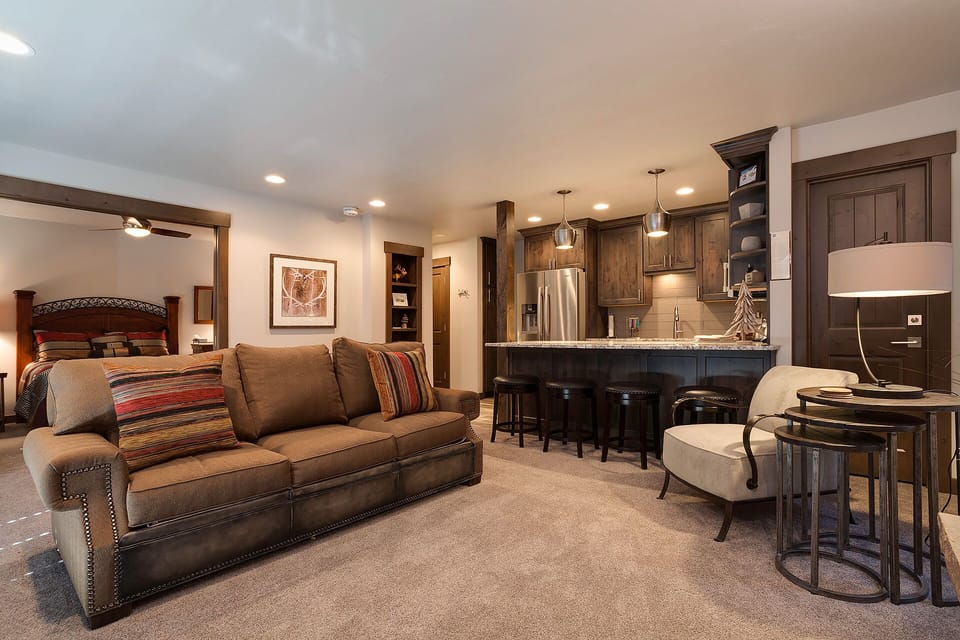 Unwind in your spacious suite where rich wood tones and mountain-inspired decor create the perfect retreat after your adventures.