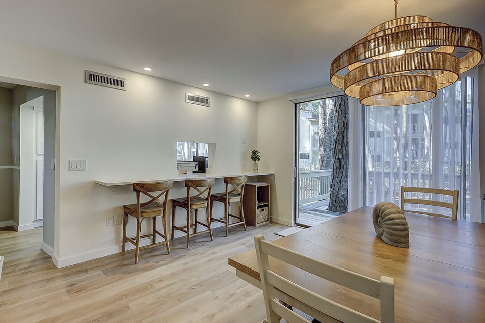 Breakfast bar - The dining room features a breakfast bar creating more space for guests to sit and enjoy a good meal or talk with those in the kitchen!