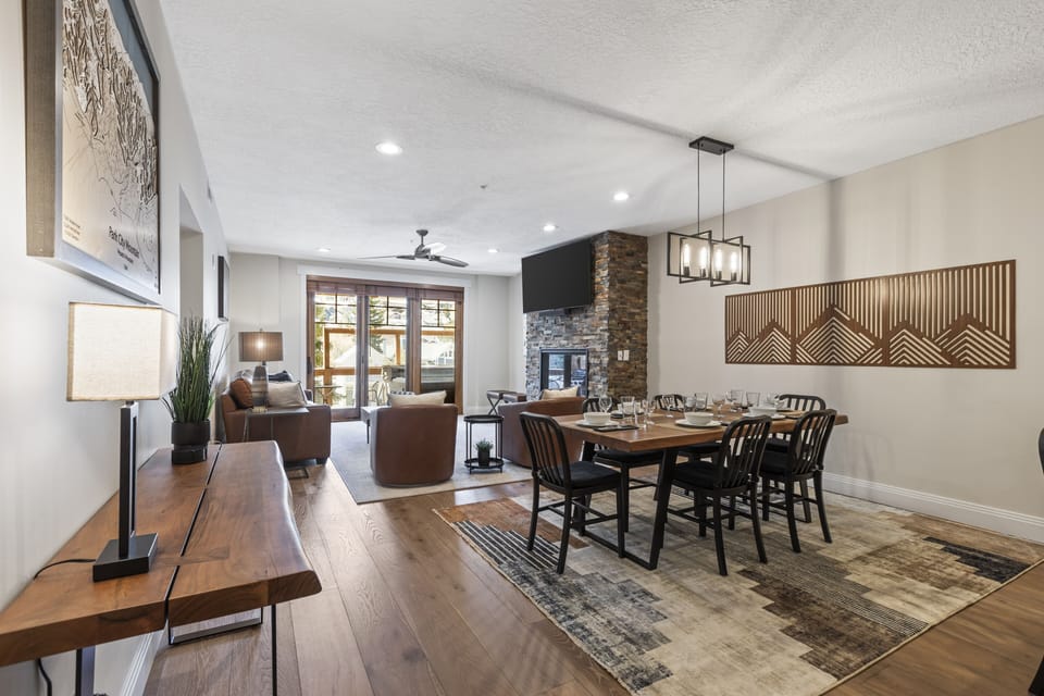 The open concept dining area with seating for 6 and the dining table.