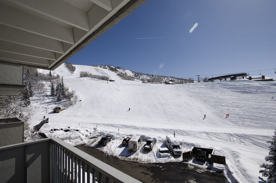 Ski slopes and mountain peaks spread before you from your private balcony, offering front-row seats to winter's grandest show.