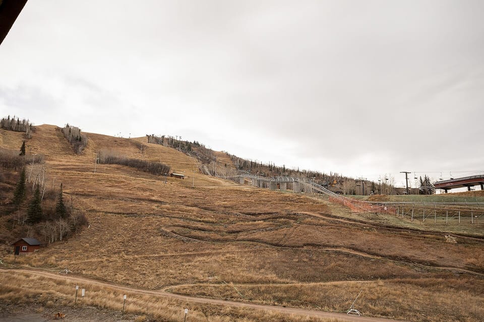 Ski slopes and mountain terrain showcase the outdoor recreation available in this scenic mountain area.