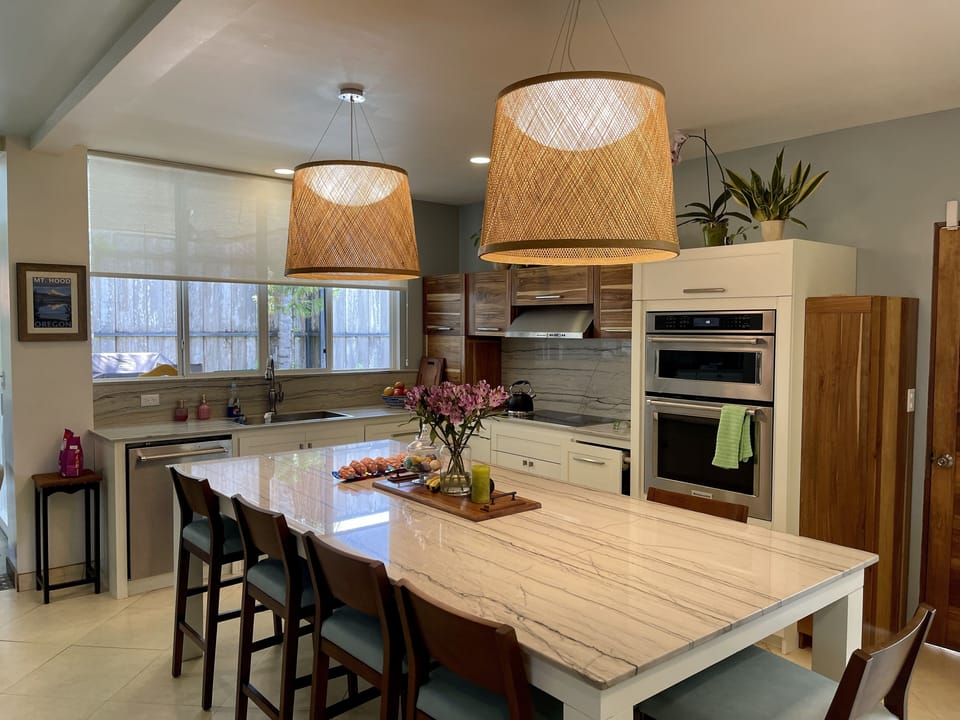 view the pool and dining from the kitchen