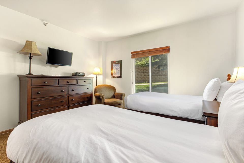 The second bedroom has two twin beds that can be converted to a king-size bed with at least 24-hours advanced notice.