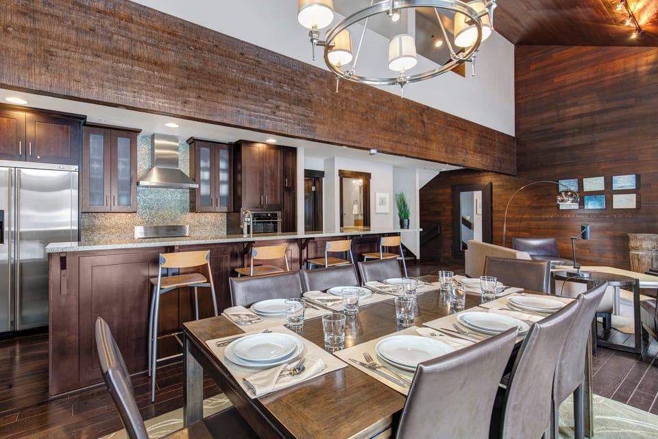 The dining area and open concept kitchen with island.