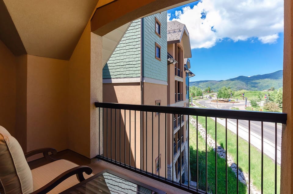 Step onto your private balcony with mountain views and breathe in the fresh alpine air.