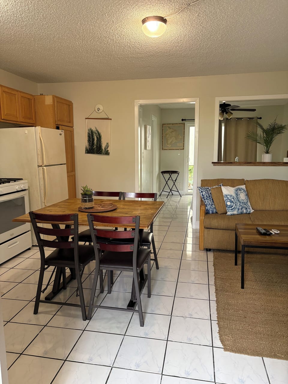 Standing in the front door looking into the place (old fridge pictured)