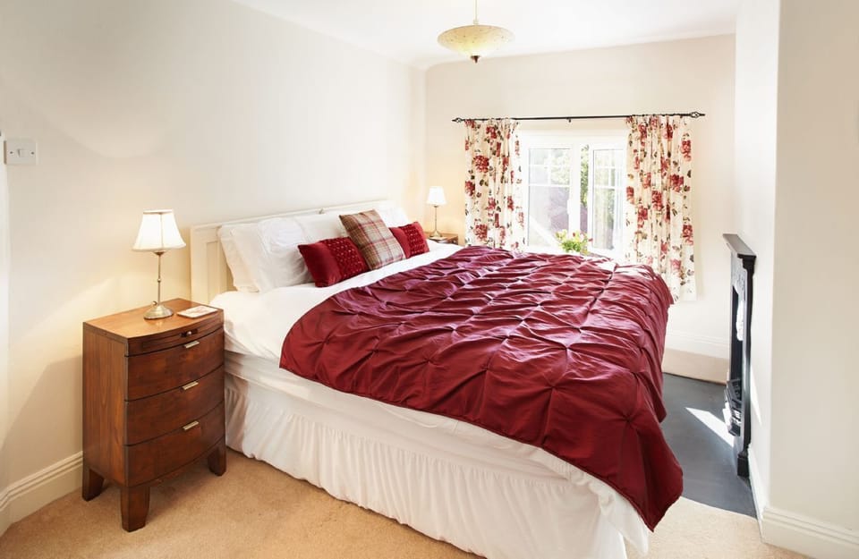 First floor: Bedroom one with a choice of twin single beds or a super-king size bed