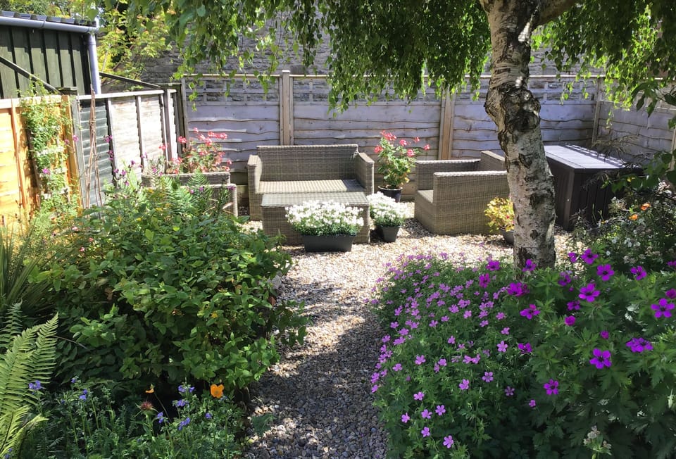 Relax on the secluded seating in the beautiful garden