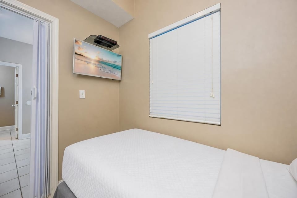 Stream your favorite shows from the wall-mounted TV as you settle into the cozy sleeping area with a twin