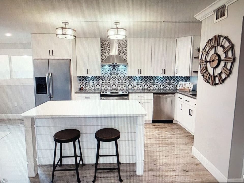 Renovated kitchen - Quartz counters, stainless appliances, soft close cabinets