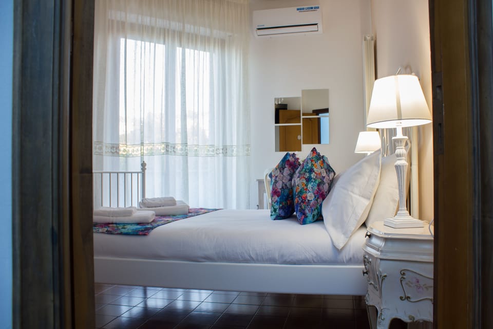 Family Room, Private Bathroom | Minibar, in-room safe, desk, iron/ironing board