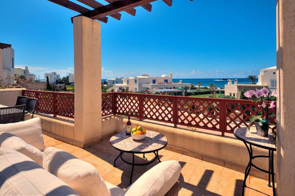 Relax and unwind on the double outdoor sofa or stretch out on the provided sun loungers.