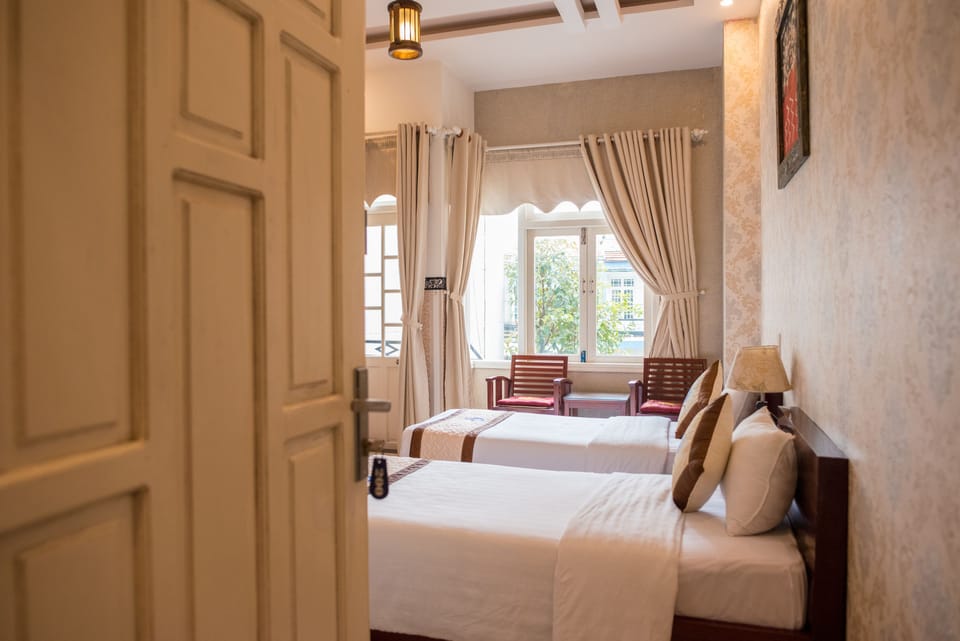 Deluxe Double or Twin Room, Balcony | Minibar, in-room safe, desk, free WiFi