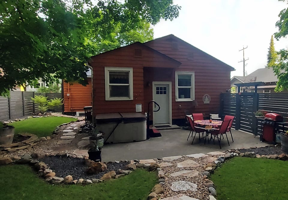 Your private entry and patio with hot tub and grill. 