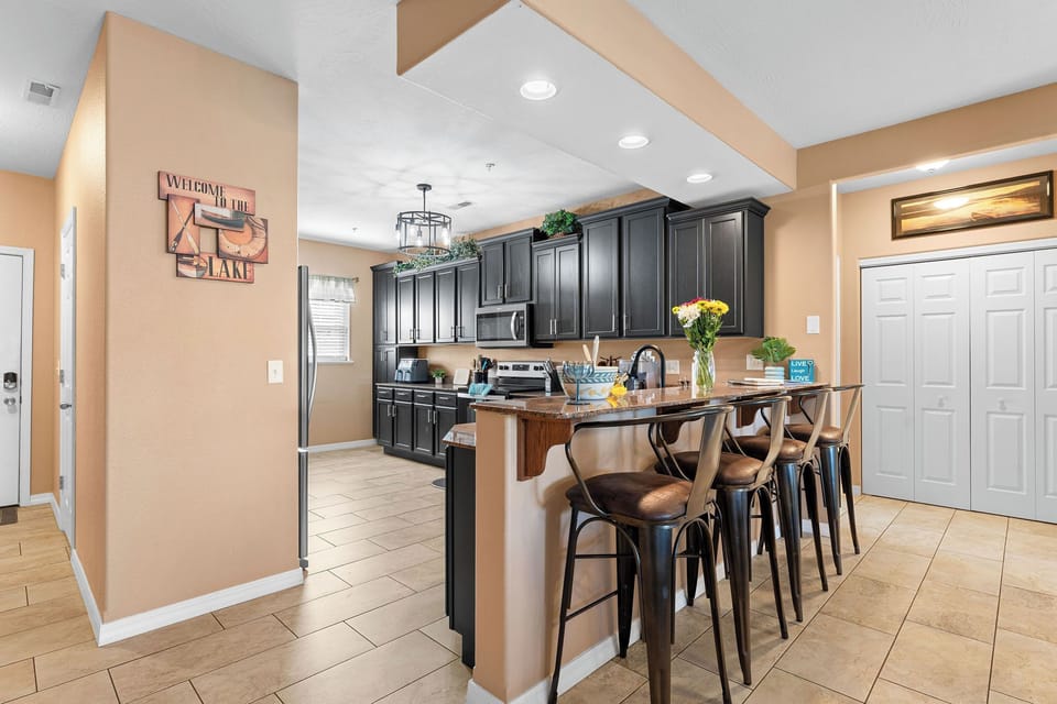The kitchen is spacious and a great place to gather to cook meals together and enjoy spending time together.