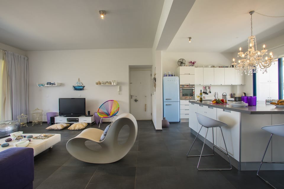 Apartment, 2 Bedrooms, Pool Access, Pool View | Living area | Flat-screen TV