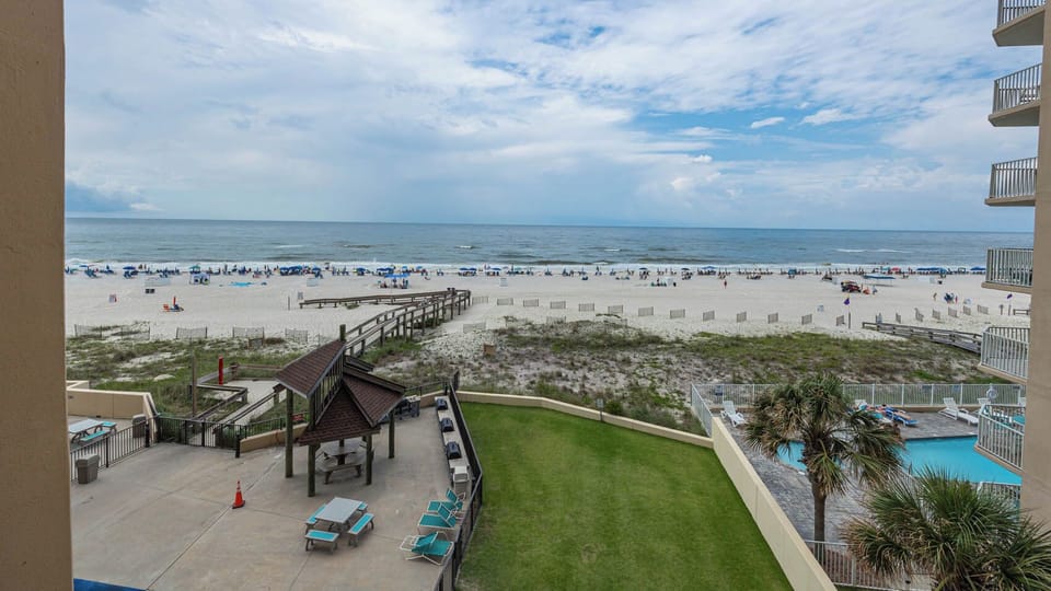 Enjoy the beautiful beach view from your private balcony, perfect for relaxation and soaking in the coastal ambiance