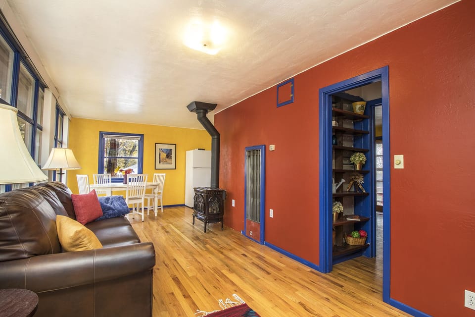 Living room and door to bedroom/bathroom