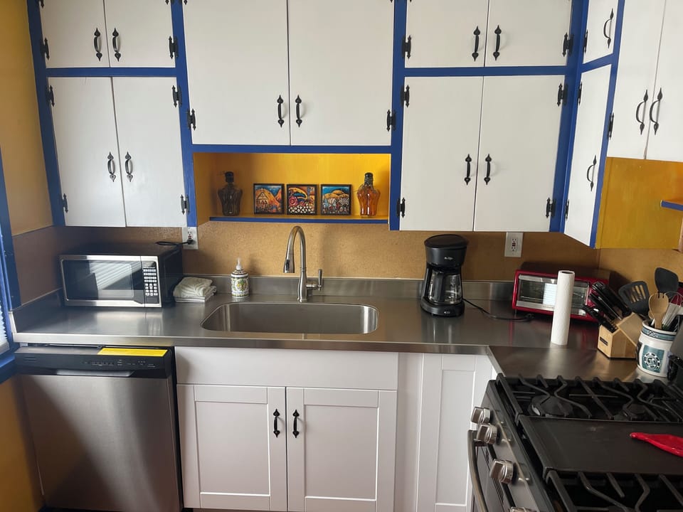 Remodeled kitchen with new refrigerator, new stove and new dishwasher