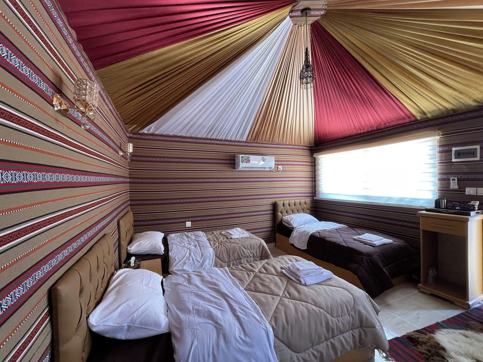 Deluxe Tent, 3 Twin Beds, Private Bathroom | Free WiFi, bed sheets