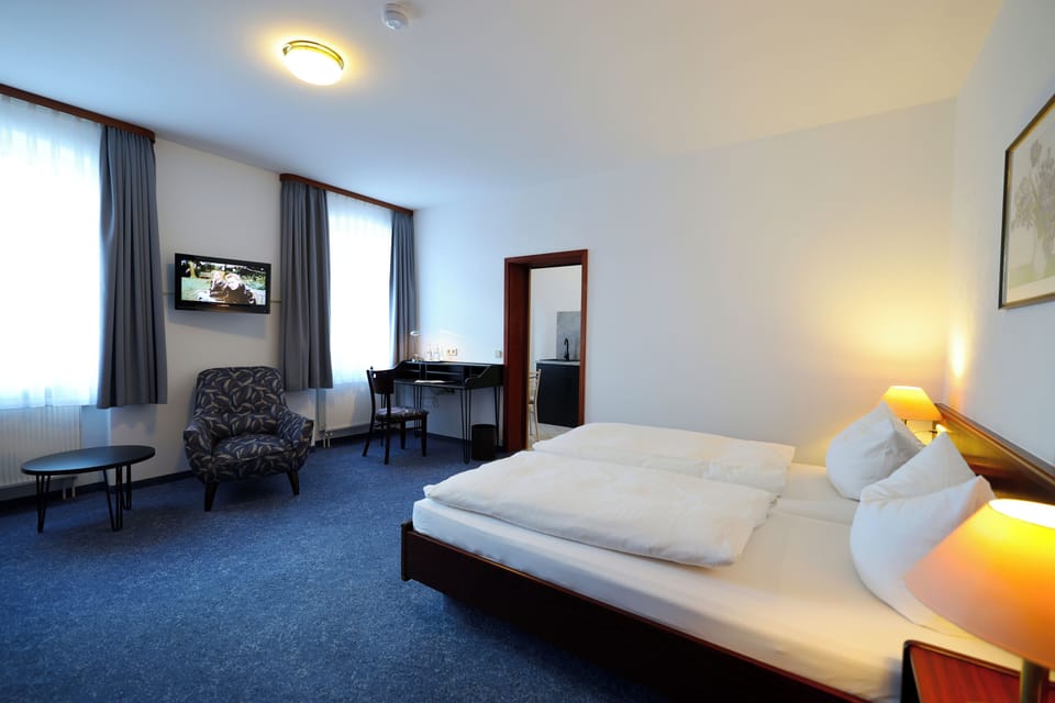 Comfort Quadruple Room | In-room safe, desk, soundproofing, cribs (surcharge)