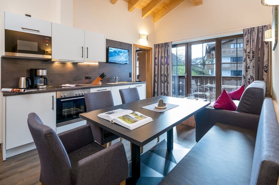 Classic Apartment | Living area | 32-inch flat-screen TV with cable channels, TV, heated floors