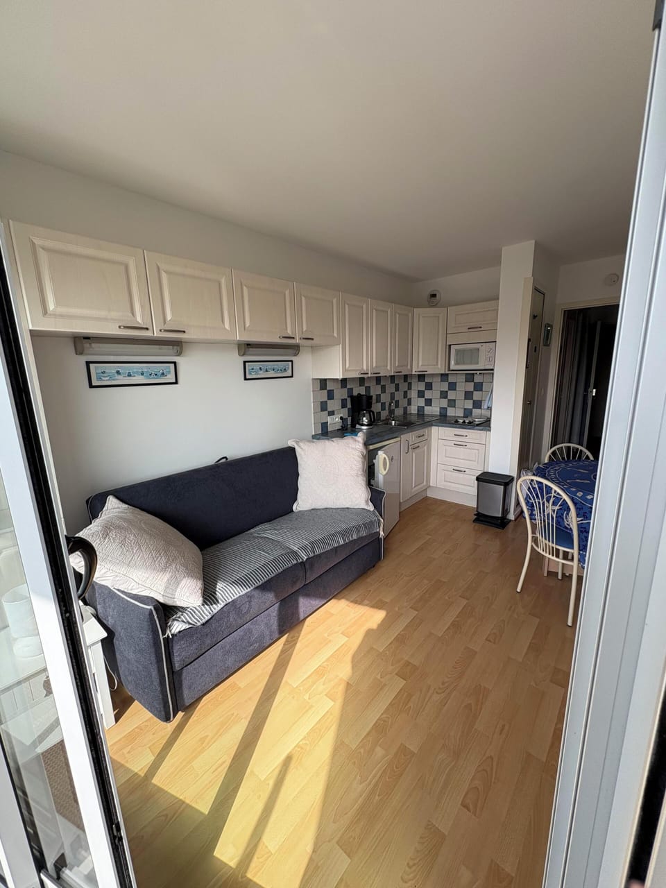 Basic Studio, Balcony, City View | Living area | 15-inch flat-screen TV with digital channels
