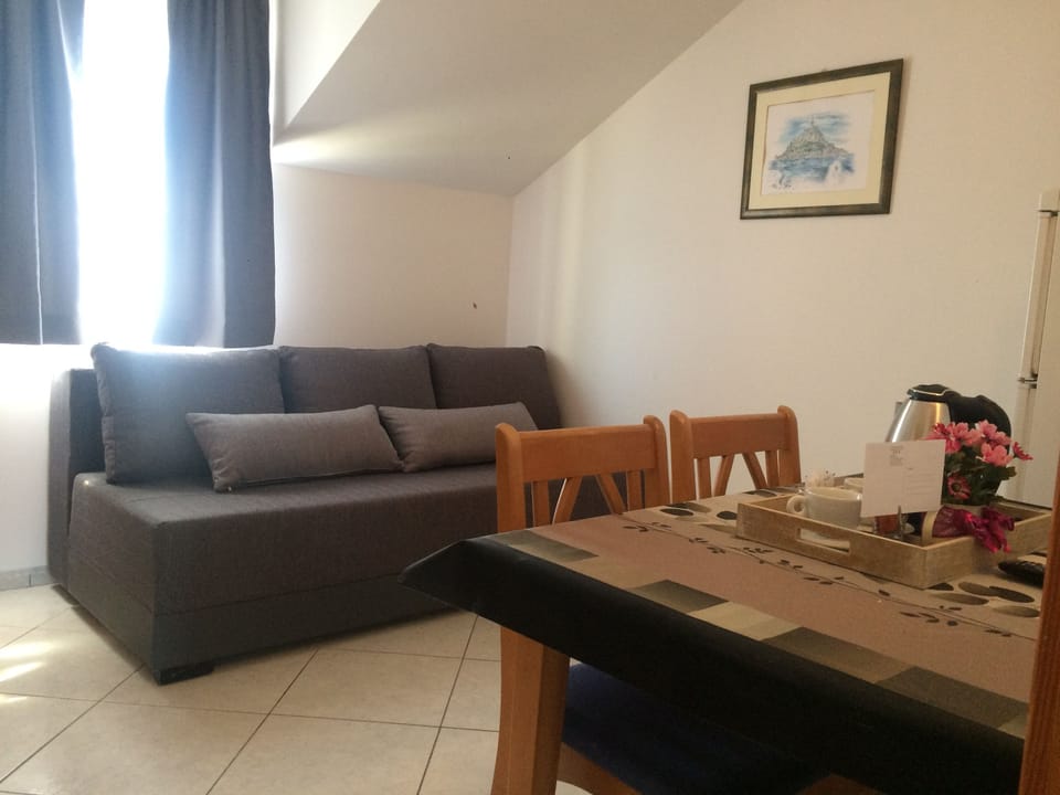 Apartment, 1 Queen Bed with Sofa bed, Balcony | Living room | LCD TV