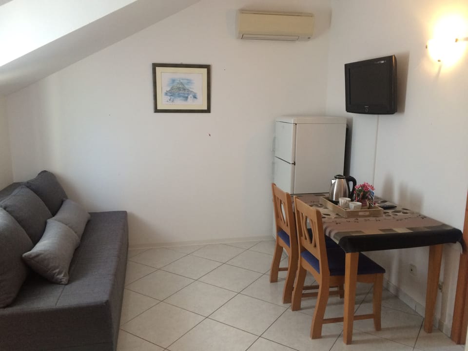 Apartment, 1 Queen Bed with Sofa bed, Balcony | Living room | LCD TV