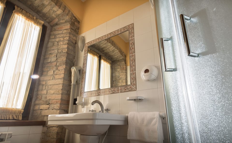 Deluxe Double Room, 1 Queen Bed, Terrace, Garden View (La Mimosa) | Bathroom | Shower, free toiletries, hair dryer, bathrobes