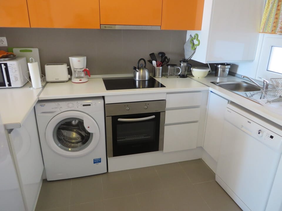 Apartment's kitchen with modern appliances