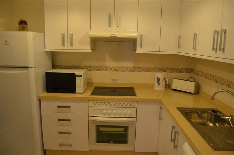 Modern Kitchen equipped with latest kitchen appliances