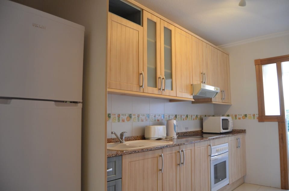 Spacious kitchen with modern kitchen ware