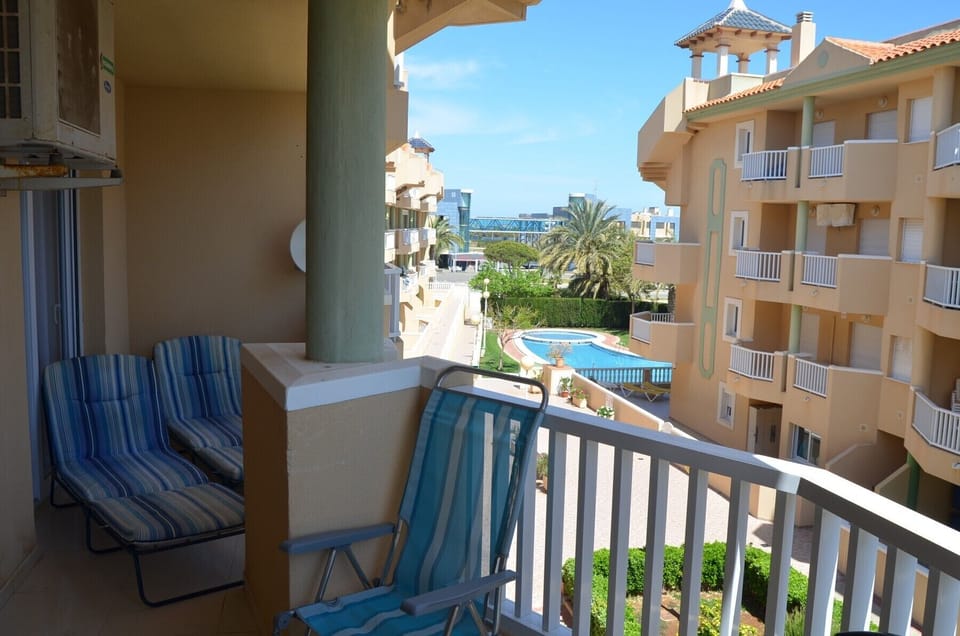 Spacious balcony with relaxing chairs