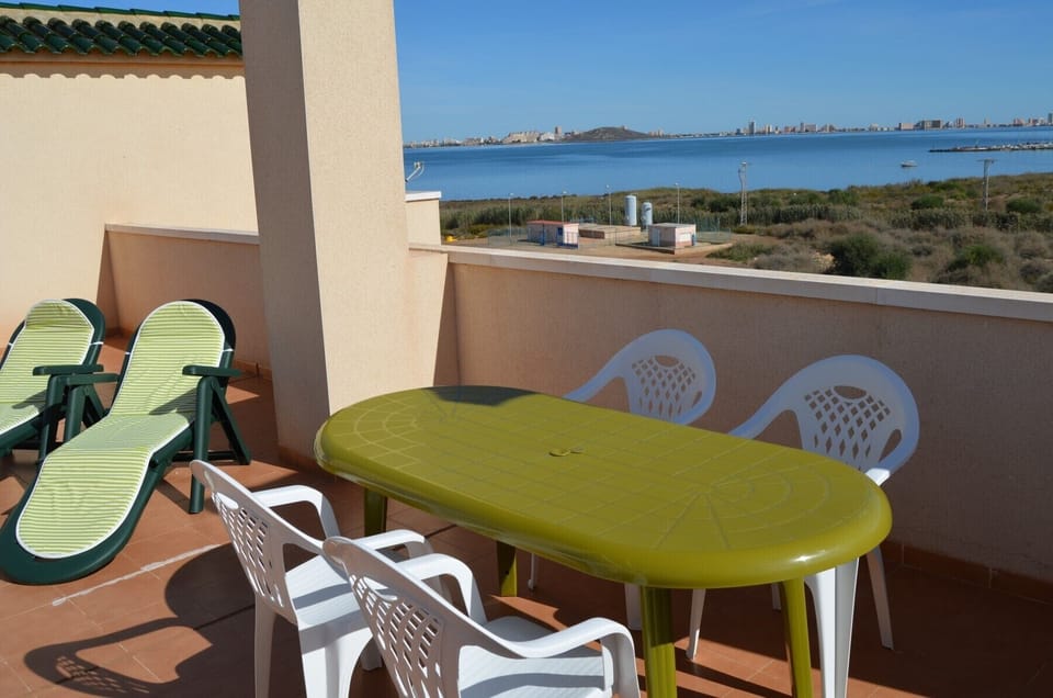 Spacious terrace with dining area and relaxation area