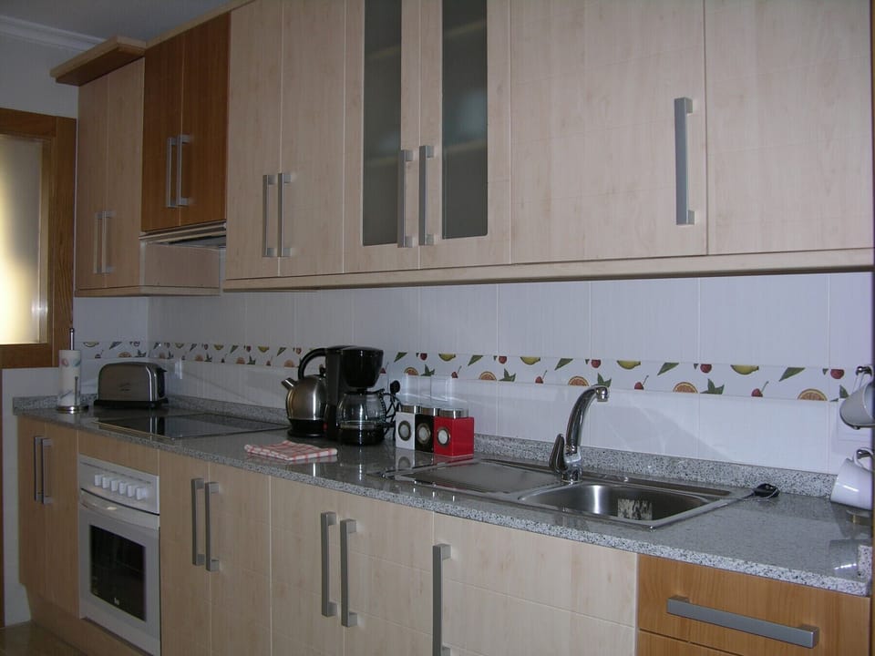 Spacious kitchen with modern kitchen ware