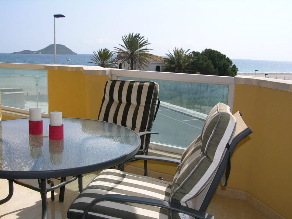 Spacious balcony with sitting area and nice views