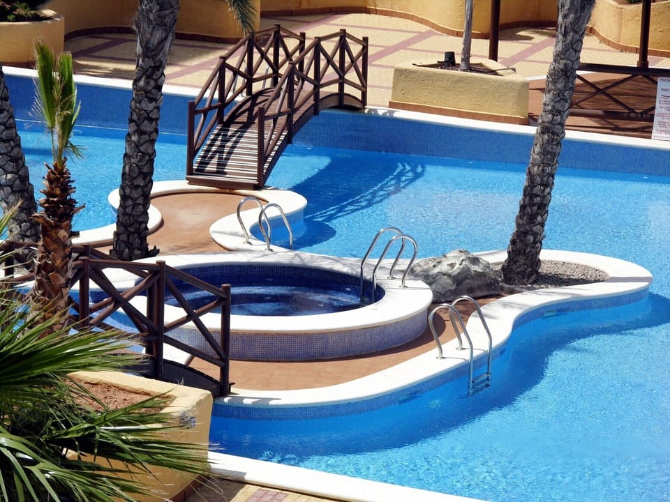 One of the lovely swimming pool at Verdemar apartment and is perfectly ideal for relaxing.