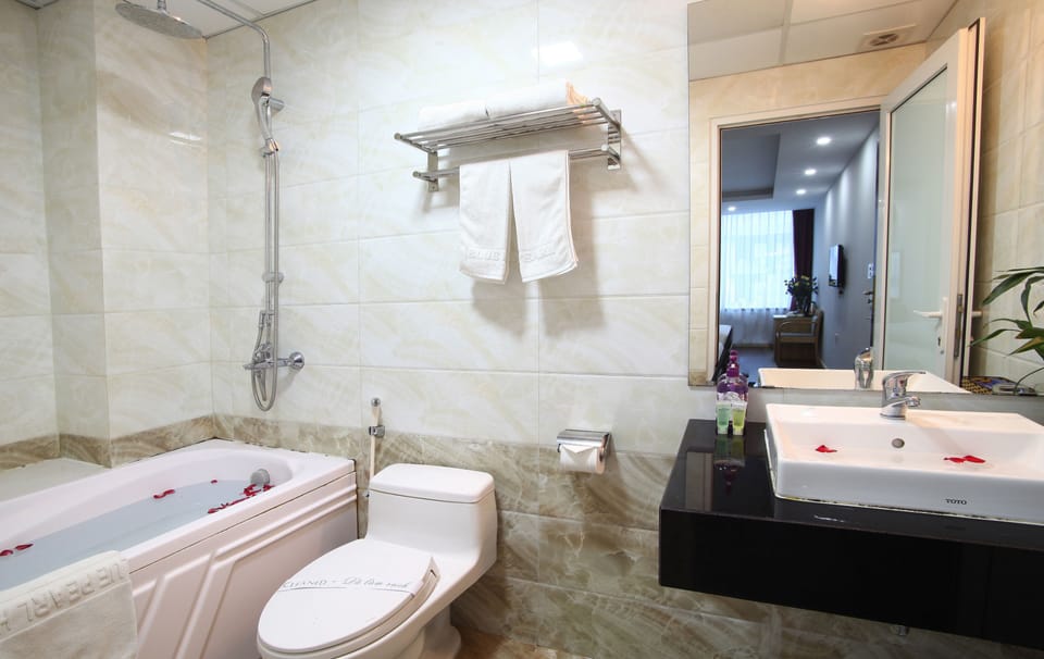 Shower, free toiletries, hair dryer, slippers